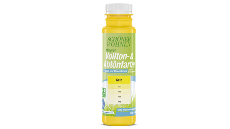 Das Produkt SCHÖNER WOHNEN Mineral Vollton-&Abtönfarbe in der Farbe Gelb. Durchsichtige Flasche mit einem grün Logo mit weißer und blauer Schrift